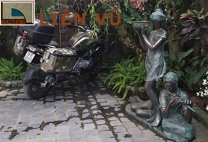 Tượng cô gái điêu khắc